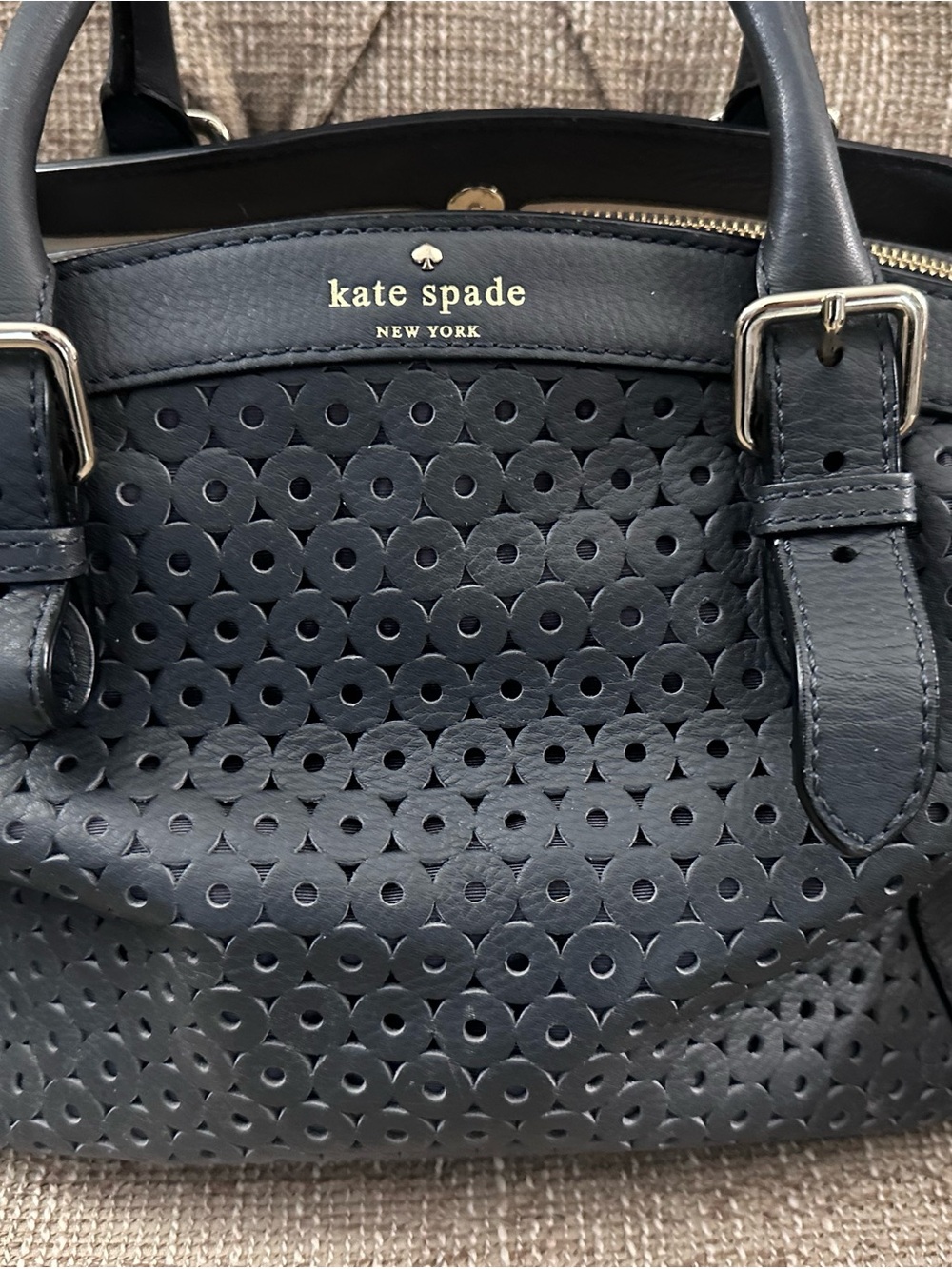 kate spade black perforated leather satchel with gold logo